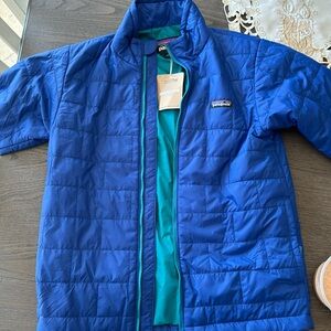 Brand new boys Patagonia nano puff, quilt jacket. With tag. Never worn